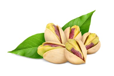 Image of Unshelled pistachios and green leaves on white background. Tasty nut