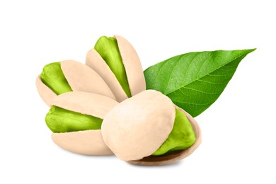 Image of Unshelled pistachios and green leaf on white background. Tasty nut