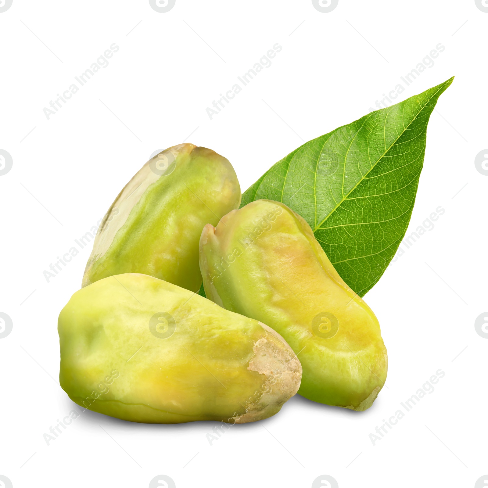 Image of Shelled pistachios and green leaf on white background. Tasty nut