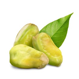 Image of Shelled pistachios and green leaf on white background. Tasty nut