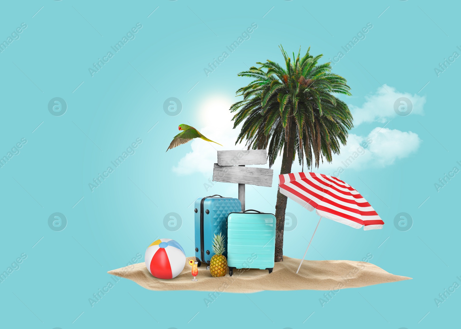 Image of Summer travel. Pile of sand with palm, suitcases, wooden direction sign, beach ball and umbrella under clouds on light blue background