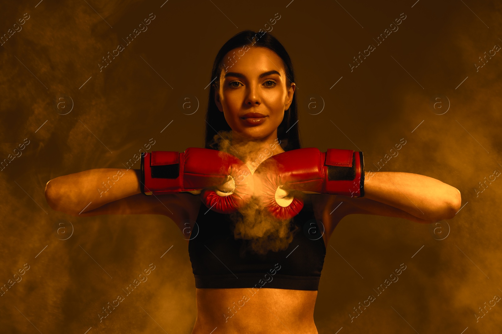 Image of Boxer training in smoke, toned in orange color