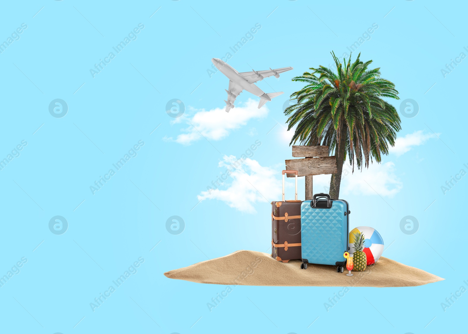 Image of Summer travel. Pile of sand with palm, suitcases, wooden direction sign, beach ball, pineapple and cocktail under clouds on blue background, space for text. Plane flying over island