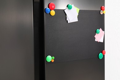 Blank magnetic board with notes on refrigerator in kitchen