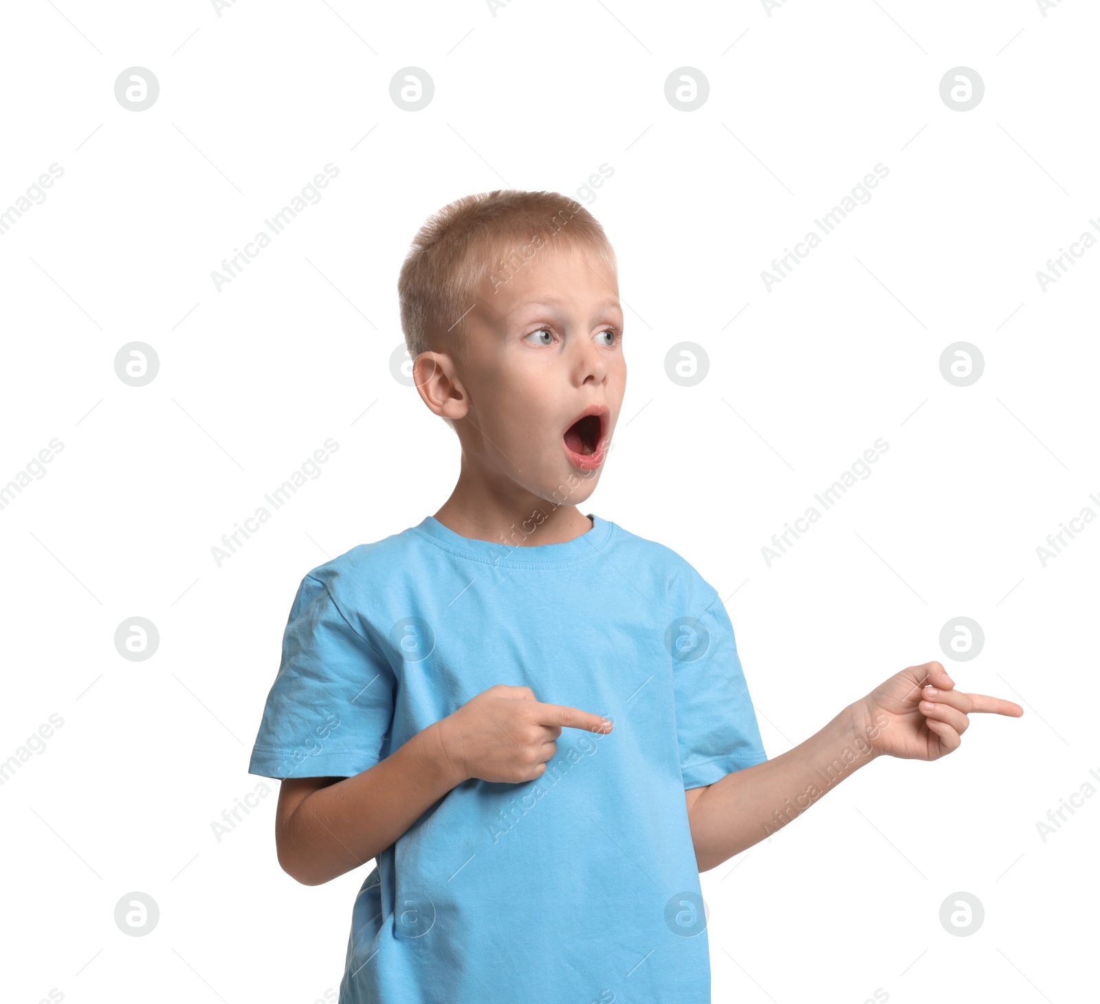 Photo of Scared little boy pointing at something on white background