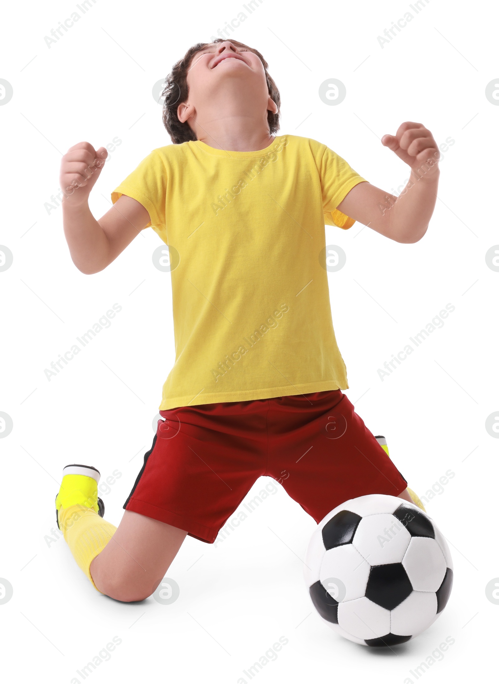 Photo of Emotional football player with soccer ball on white background