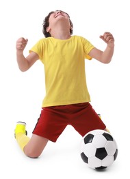 Photo of Emotional football player with soccer ball on white background