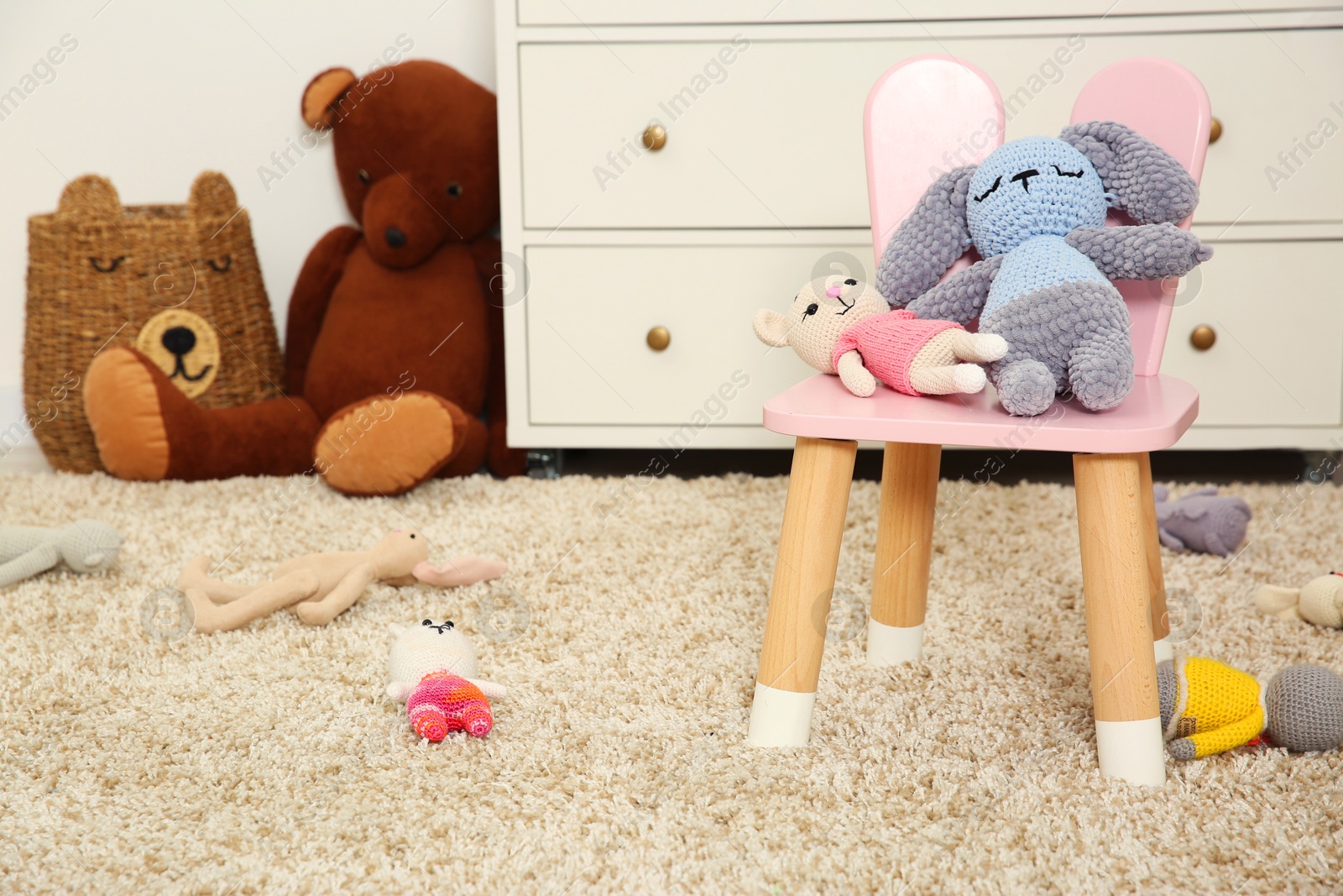 Photo of Different toys and chair in kid's room