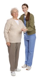 Caregiver supporting senior woman on white background. Home health care service