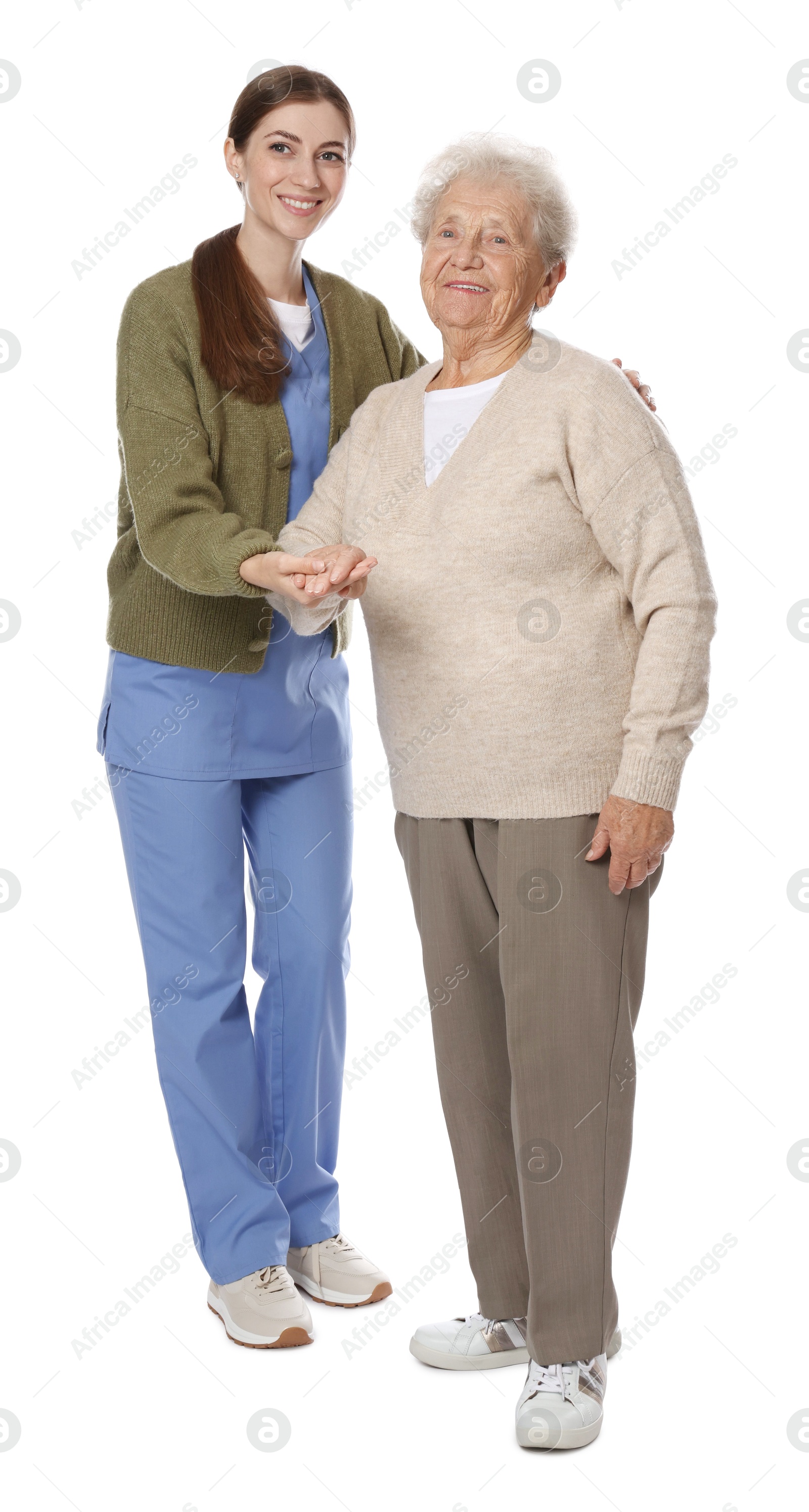 Photo of Caregiver supporting senior woman on white background. Home health care service