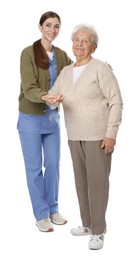 Caregiver supporting senior woman on white background. Home health care service