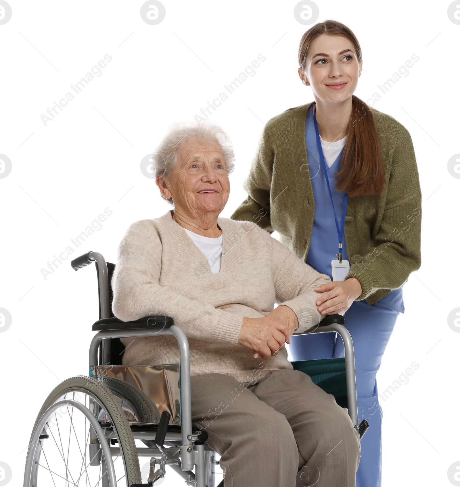 Photo of Caregiver assisting senior woman in wheelchair on white background. Home health care service