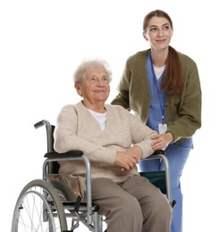 Caregiver assisting senior woman in wheelchair on white background. Home health care service