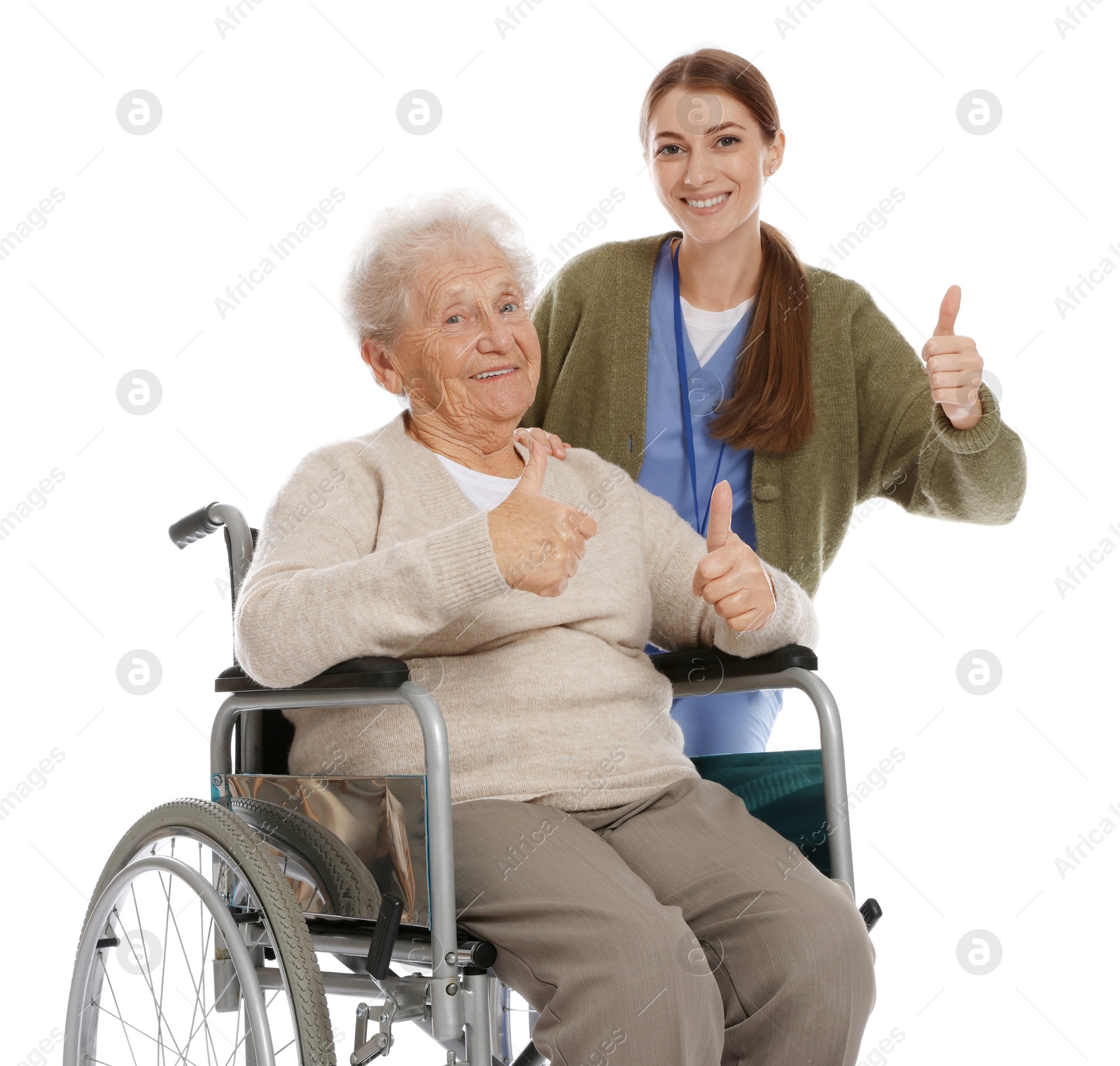 Photo of Caregiver and senior woman showing thumbs up on white background. Home health care service