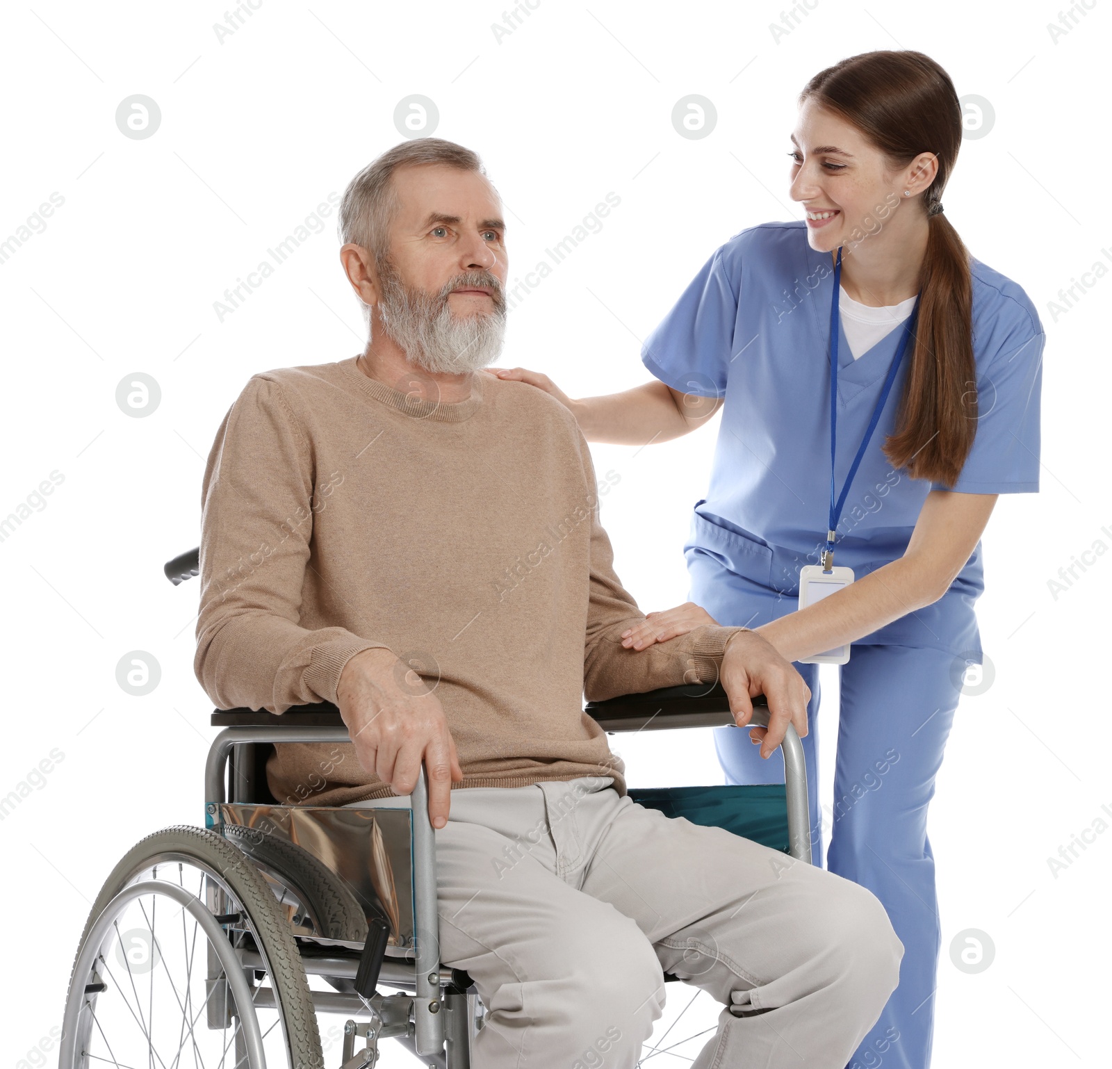 Photo of Caregiver assisting senior man in wheelchair on white background. Home health care service