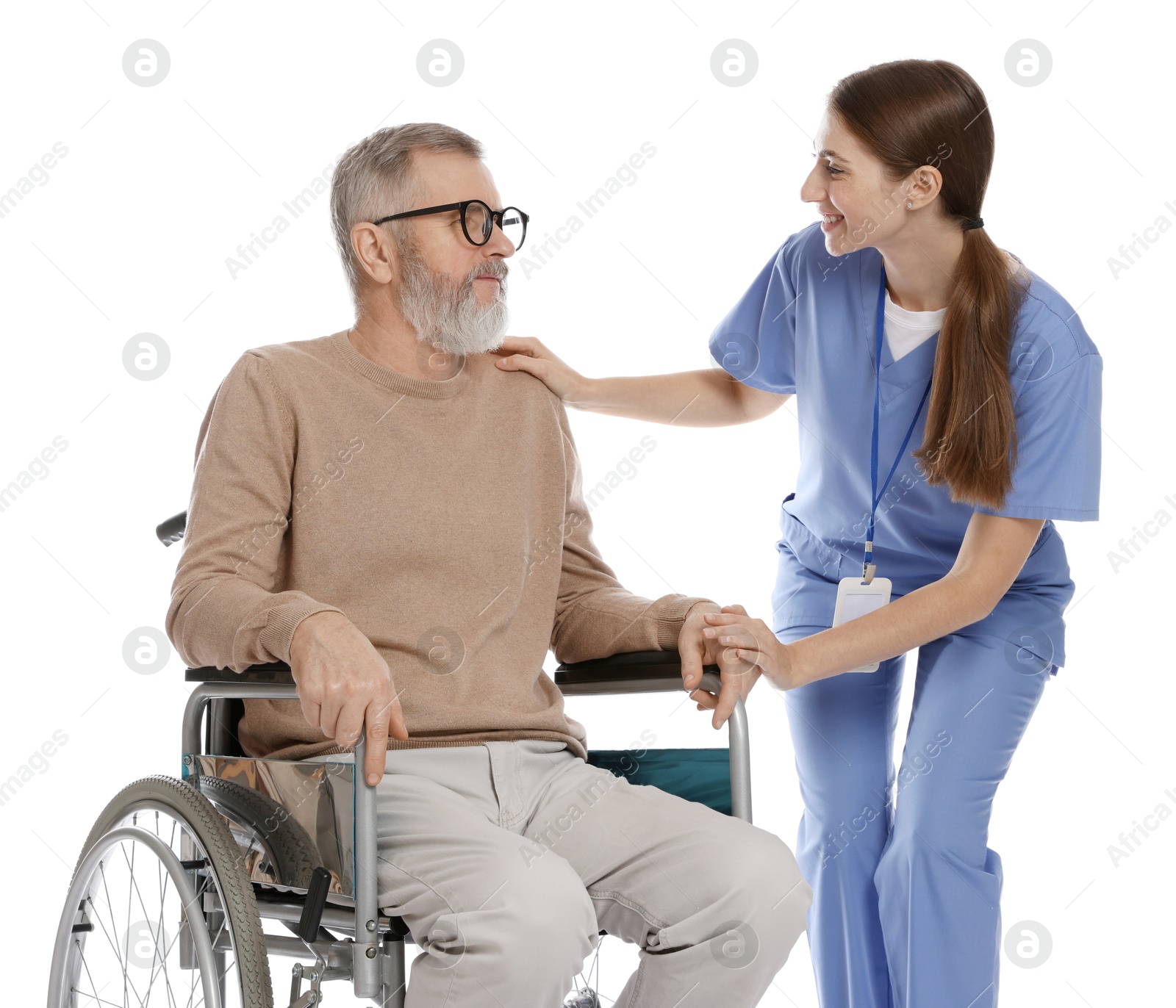 Photo of Caregiver assisting senior man in wheelchair on white background. Home health care service