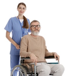 Caregiver assisting senior man in wheelchair on white background. Home health care service