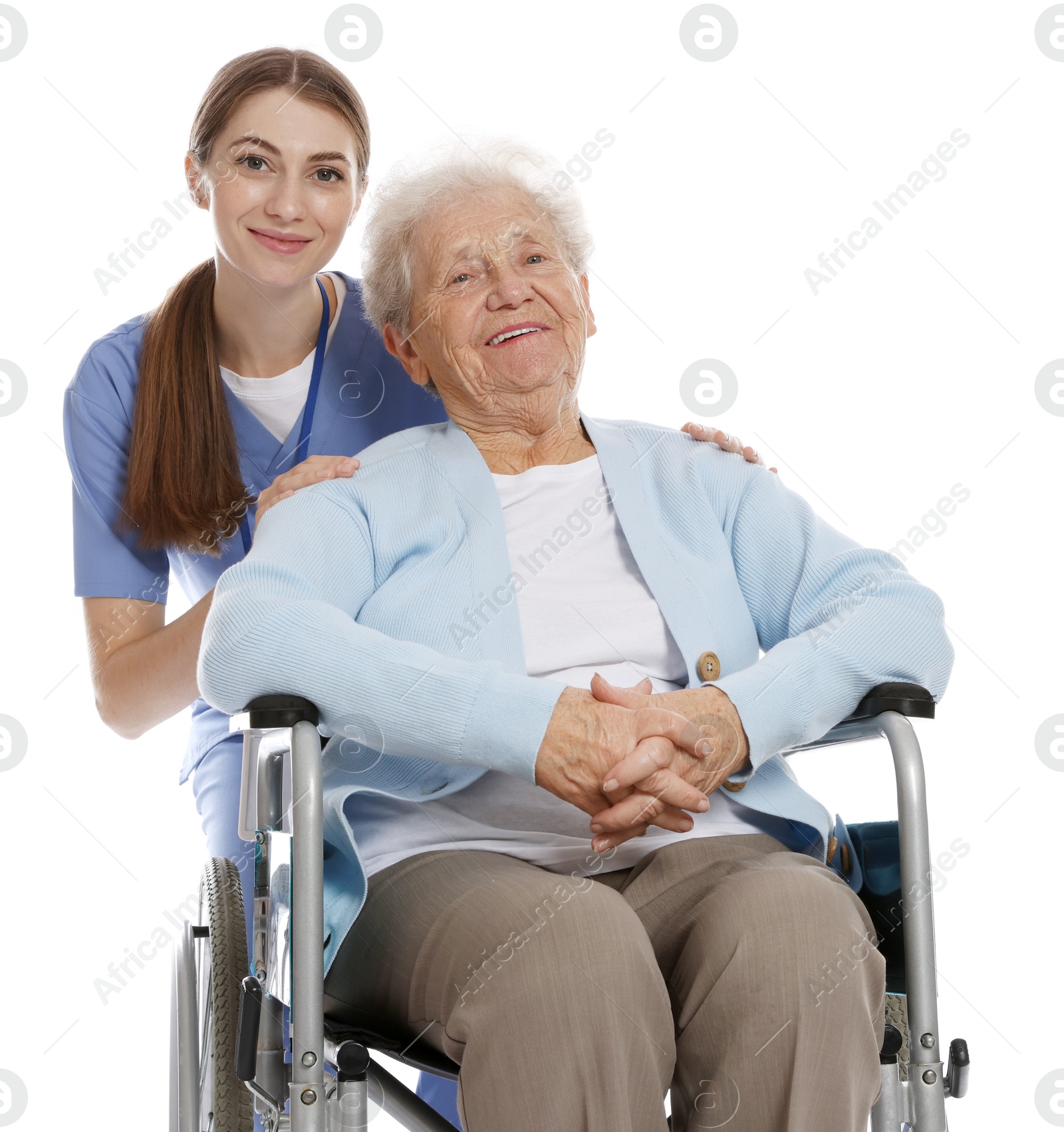 Photo of Caregiver assisting senior woman in wheelchair on white background. Home health care service