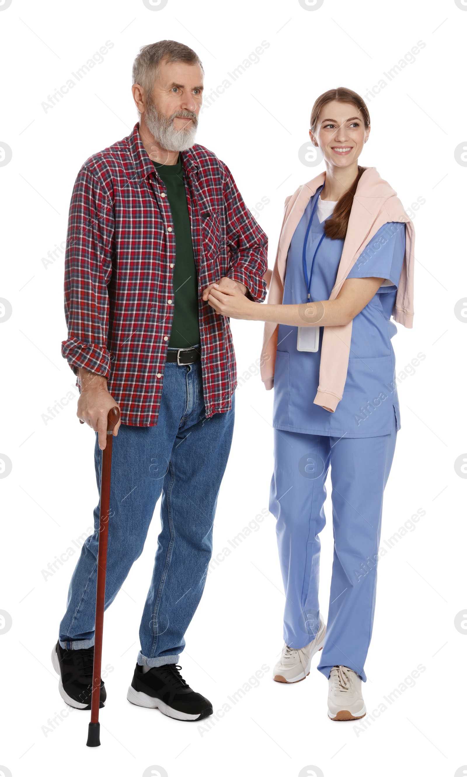 Photo of Caregiver supporting senior man with walking cane on white background. Home health care service