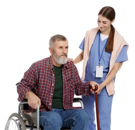 Caregiver assisting senior man in wheelchair on white background. Home health care service