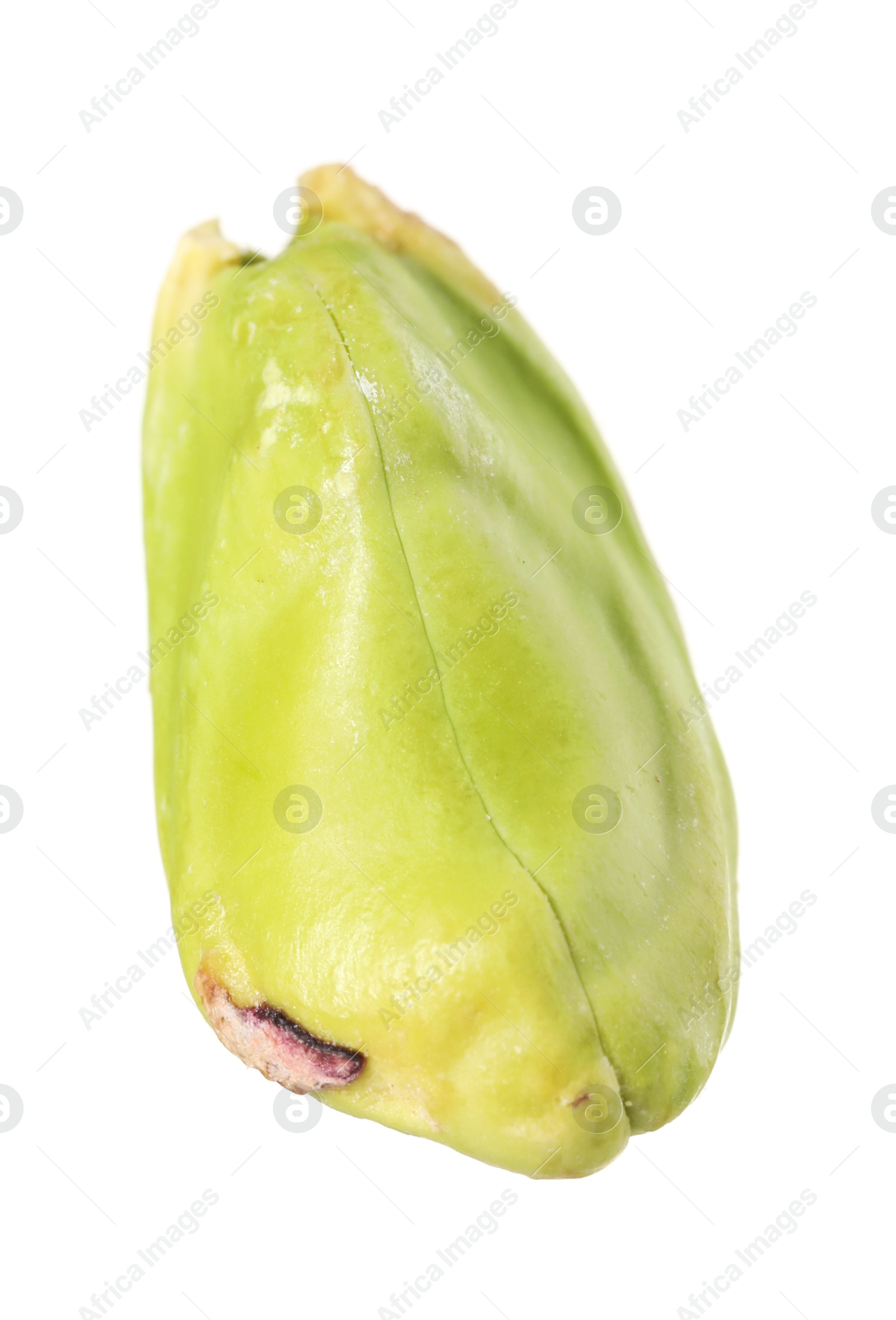 Photo of One peeled pistachio nut isolated on white