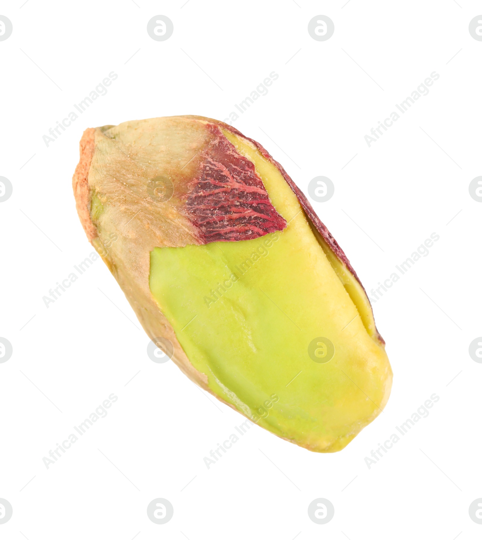 Photo of One peeled pistachio nut isolated on white