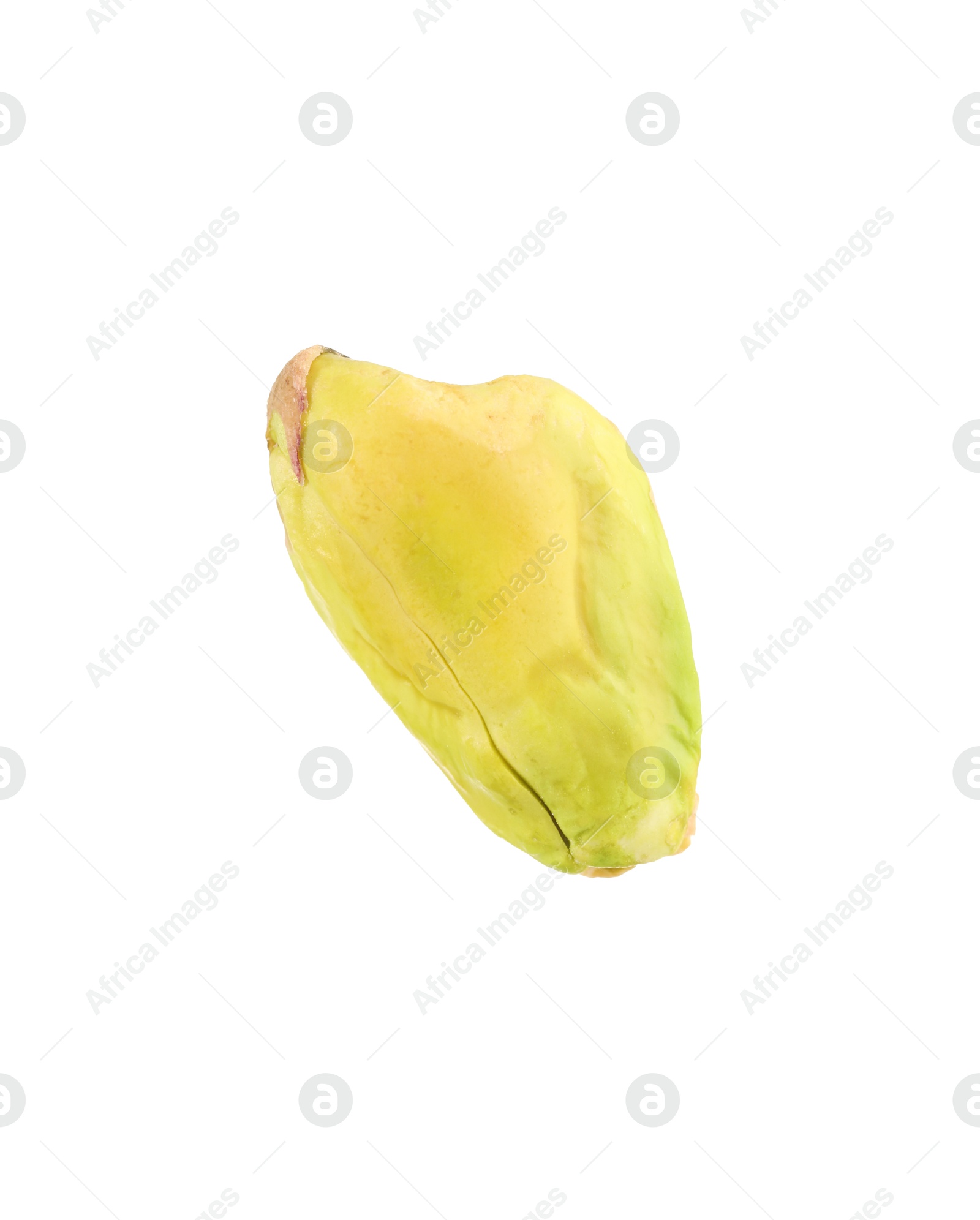 Photo of One peeled pistachio nut isolated on white