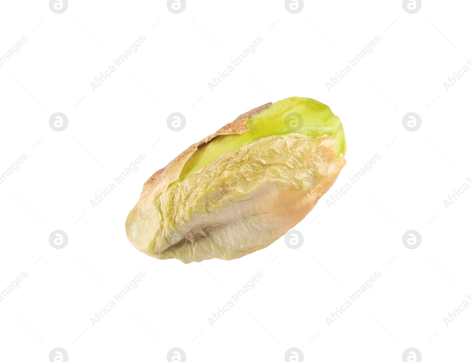 Photo of One peeled pistachio nut isolated on white