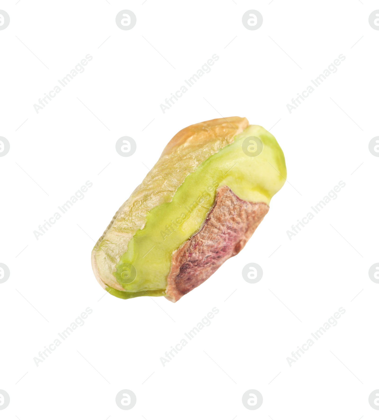 Photo of One peeled pistachio nut isolated on white