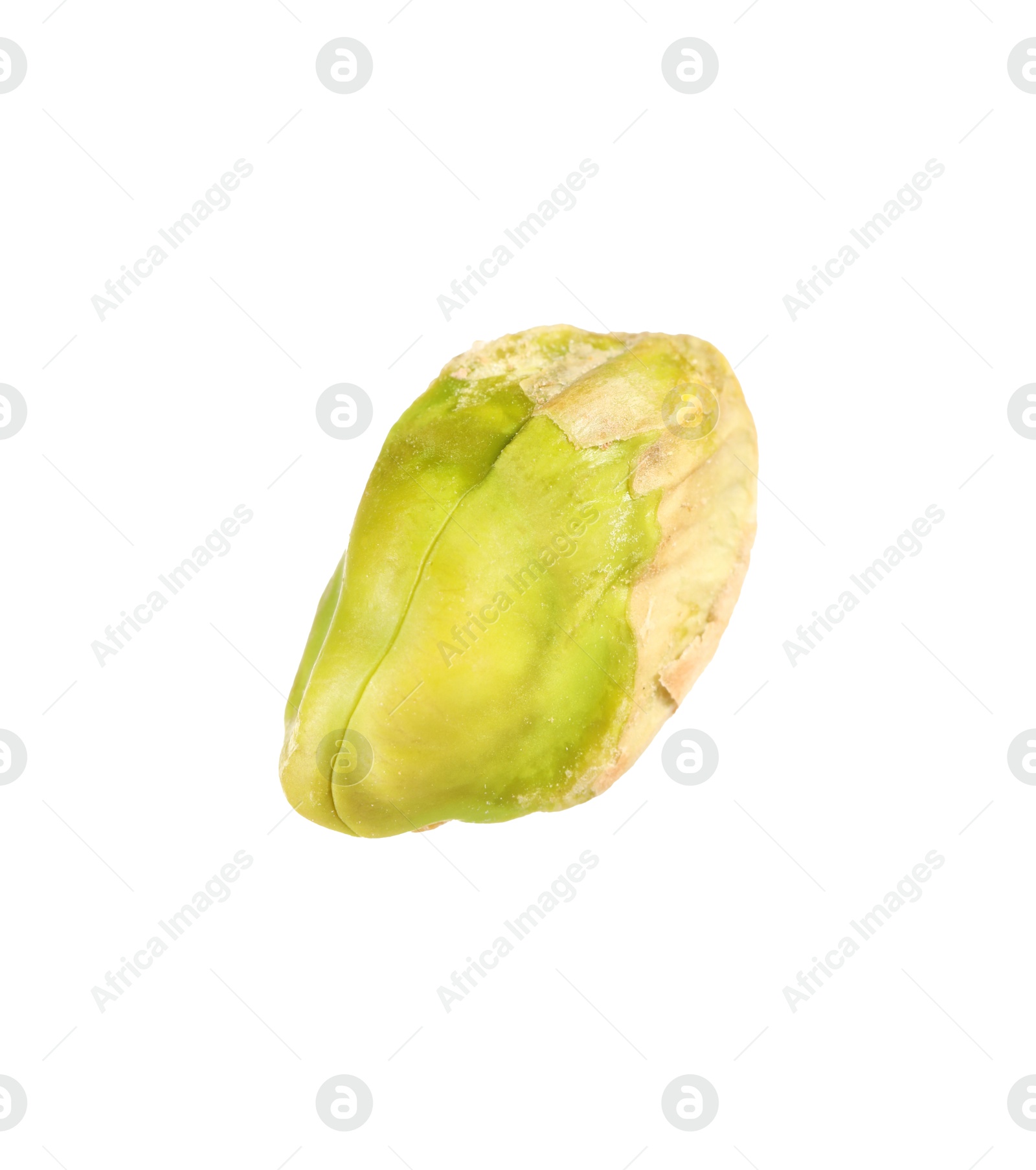 Photo of One peeled pistachio nut isolated on white