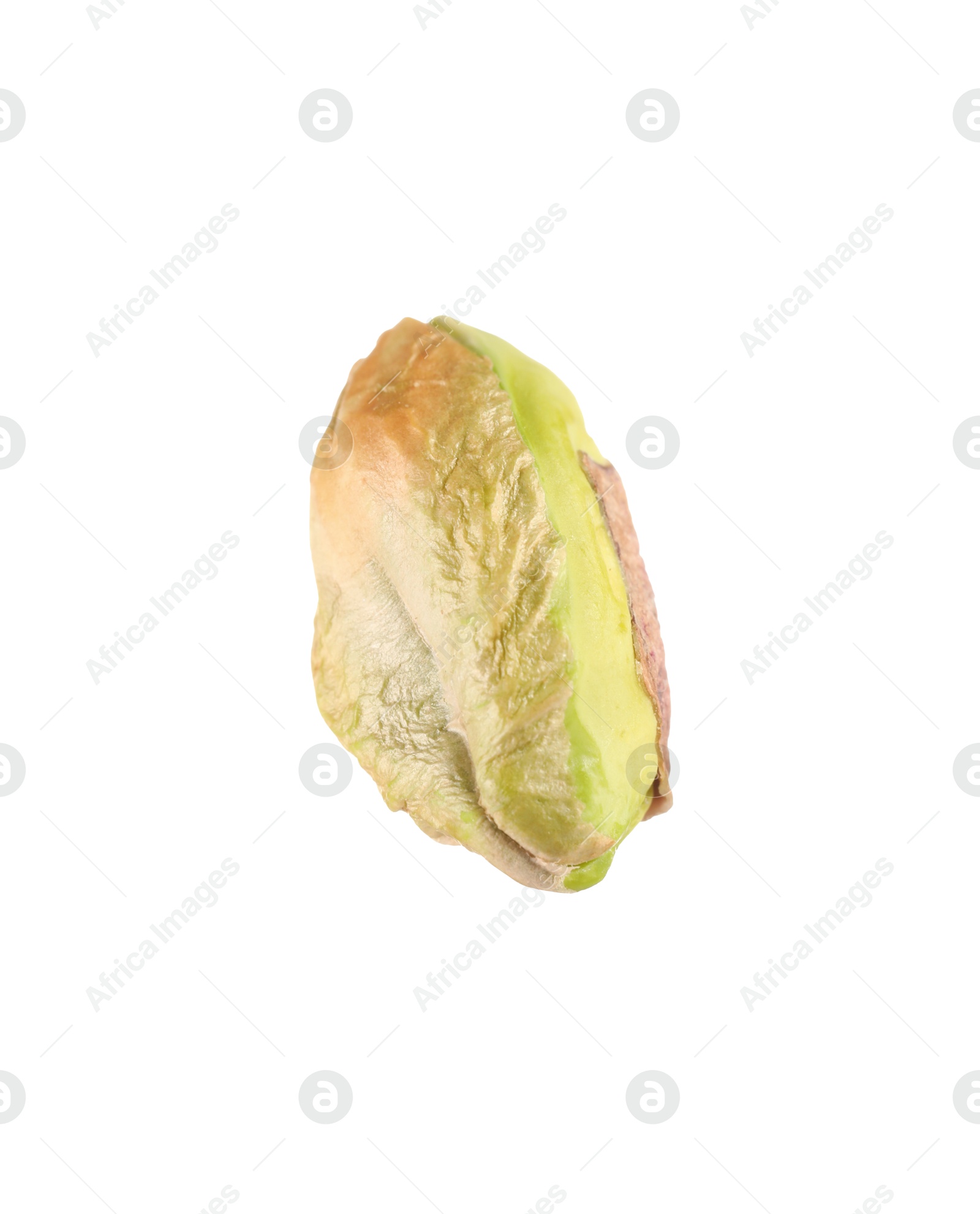 Photo of One peeled pistachio nut isolated on white