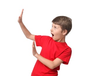 Photo of Portrait of scared little boy on white background