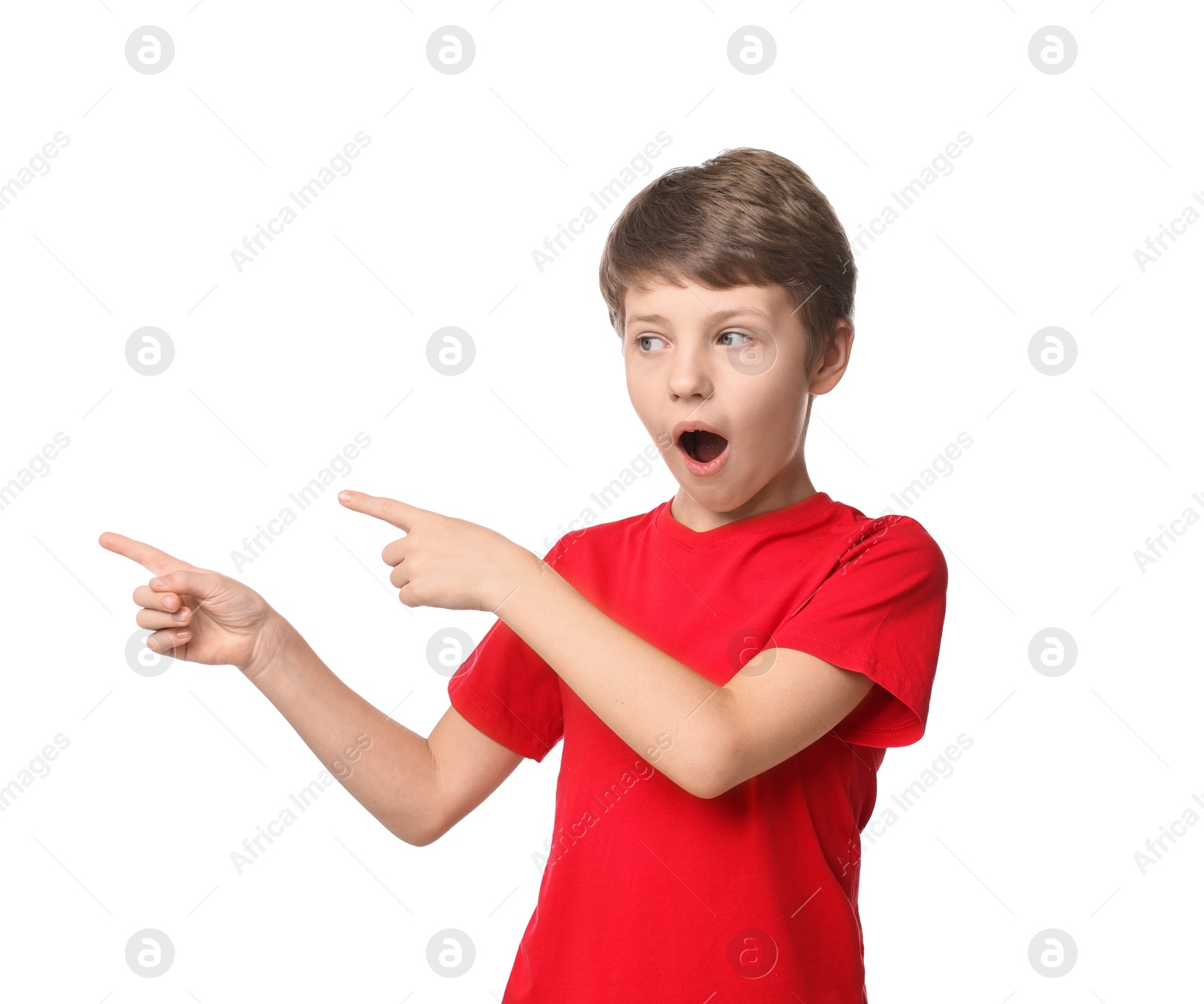 Photo of Scared little boy pointing at something on white background