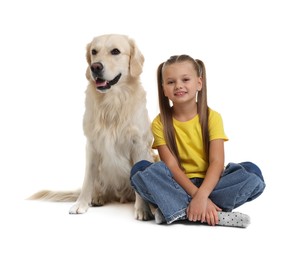 Girl with her cute Golden Retriever dog on white background