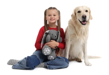 Girl with toy bunny and her cute Golden Retriever dog on white background