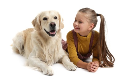 Photo of Girl with her cute Golden Retriever dog lying on white background