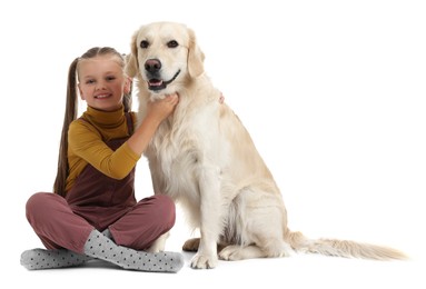 Girl with her cute Golden Retriever dog on white background