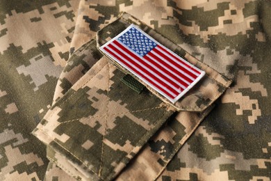 Photo of Veterans day. USA army patch on military uniform, closeup