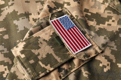 Photo of Veterans day. USA army patch on military uniform, closeup