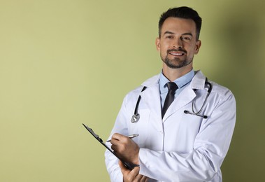 Smiling doctor with stethoscope and clipboard on olive background, space for text