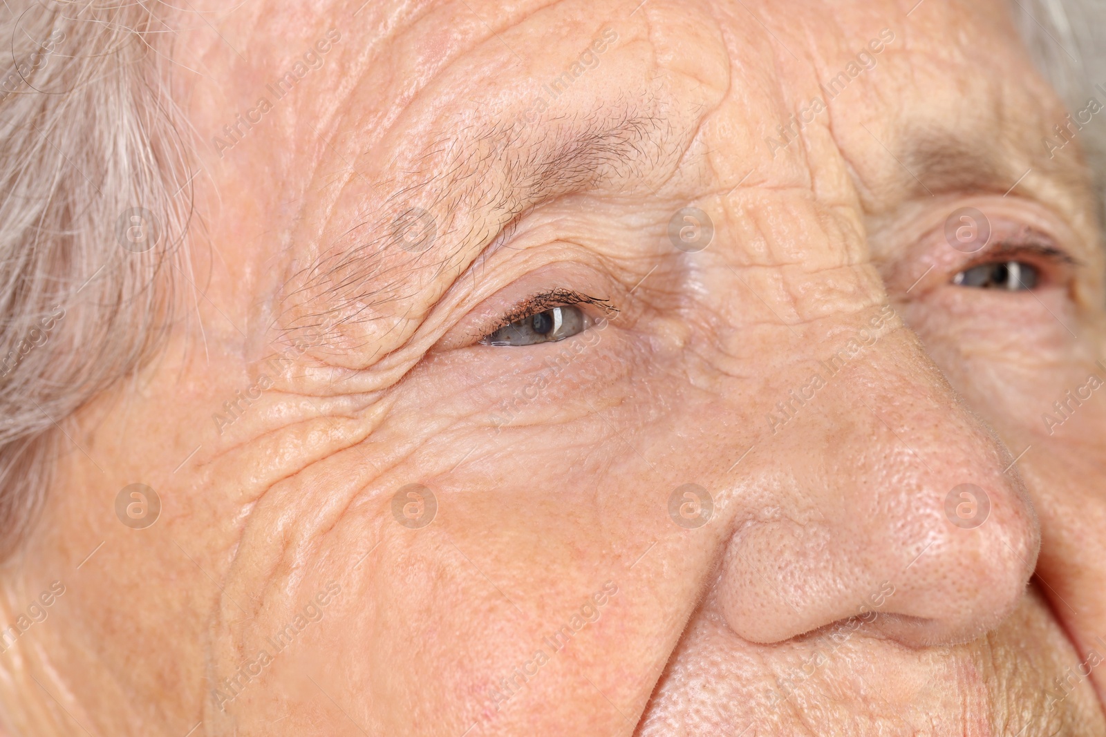 Photo of Senior woman with beautiful eyes, macro view