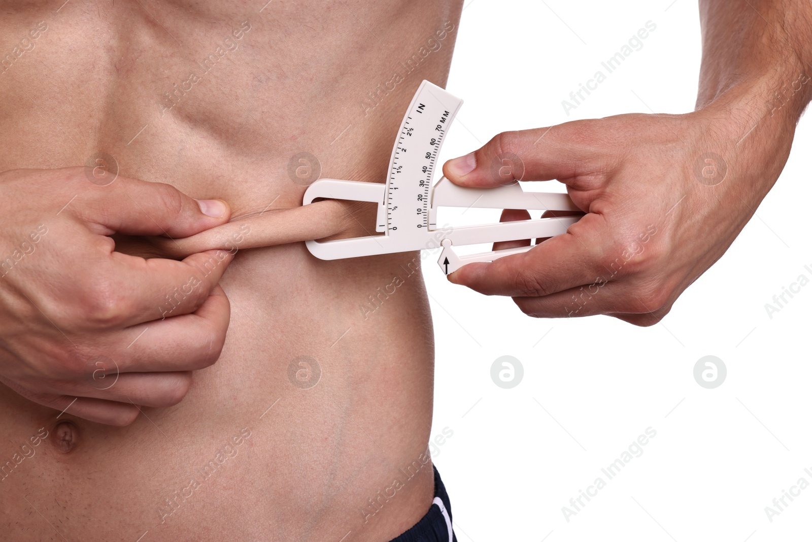 Photo of Man measuring body fat with caliper on white background, closeup