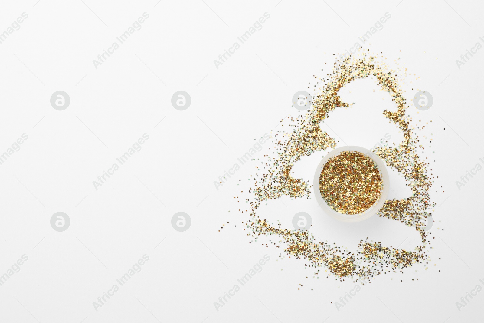 Photo of Christmas tree made of glitter on white background, top view. Space for text