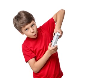 Photo of Cute little boy playing video game with controller on white background