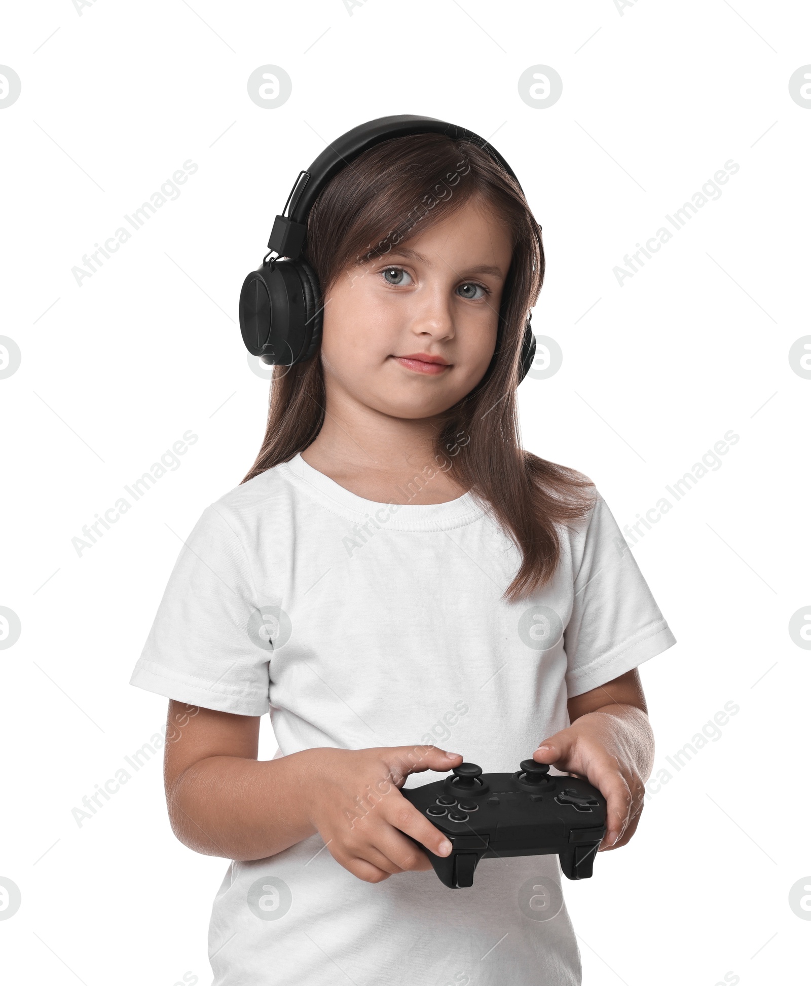 Photo of Cute little girl with controller on white background