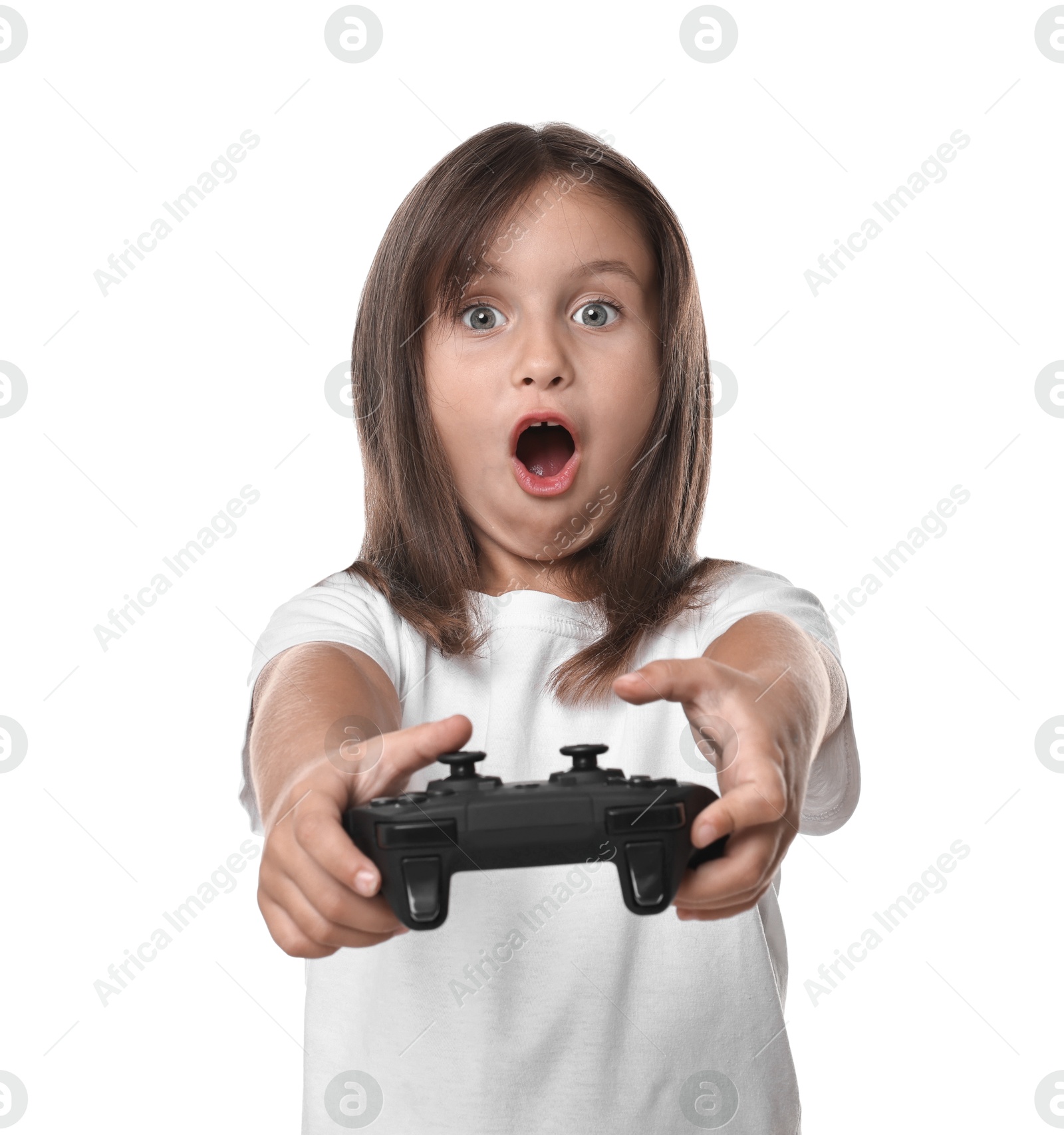 Photo of Cute little girl playing video game with controller on white background