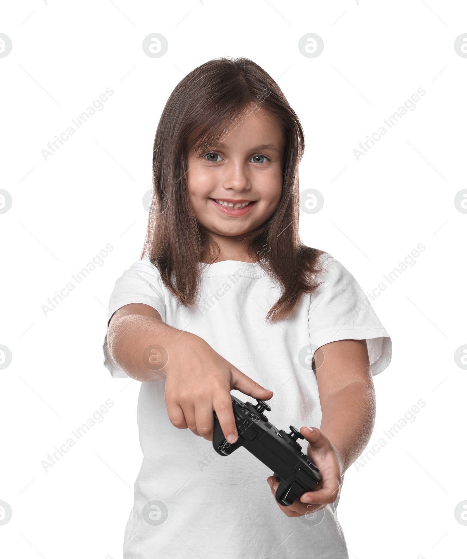 Photo of Happy little girl playing video game with controller on white background