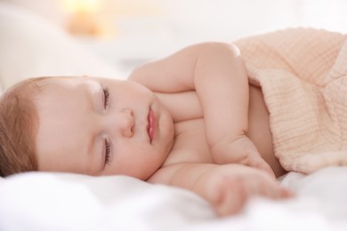 Photo of Cute little baby sleeping on bed at home