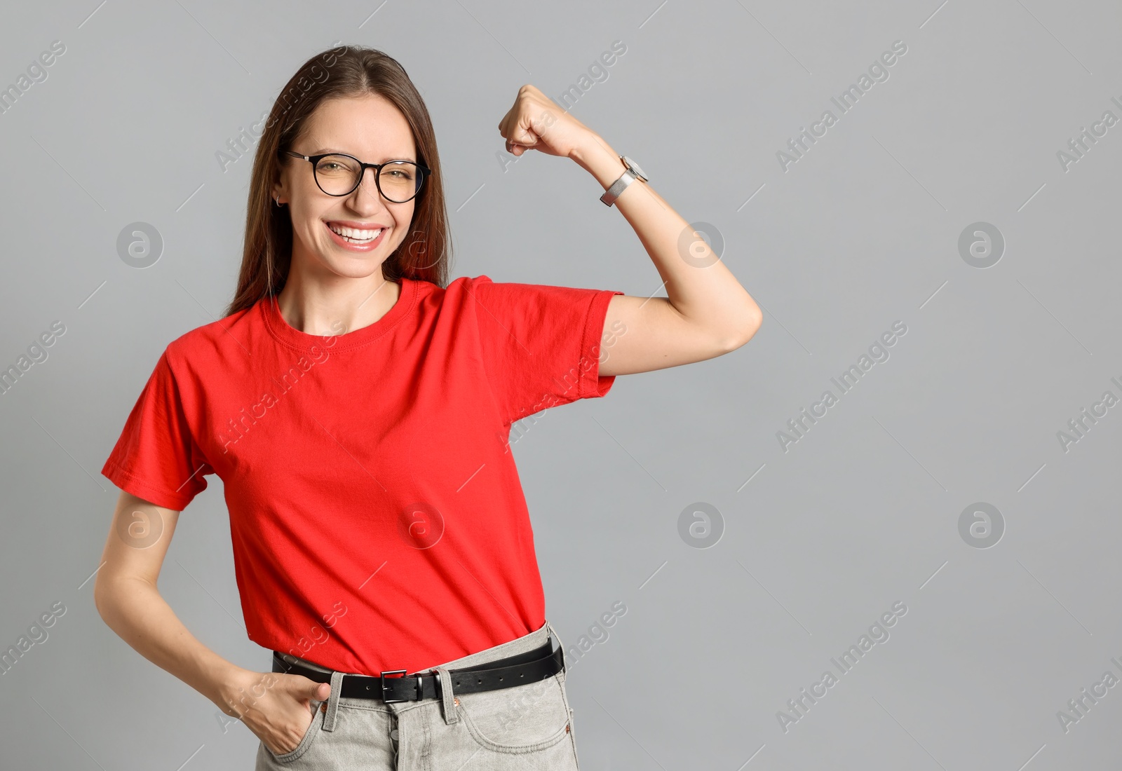 Photo of Happy winner on gray background, space for text