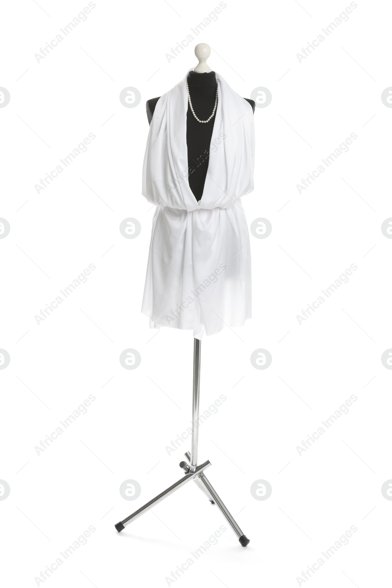 Photo of Draping fabric on female mannequin against white background